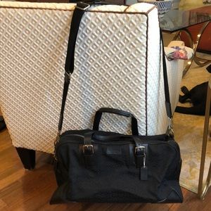 Authentic Coach black weekender bag.